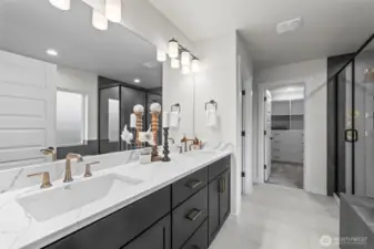 Double vanity and designer finishes.