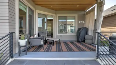 • Indoor, Outdoor Living—Extend the indoors out with dual sliding glass doors to a covered outdoor living area and a large, raised patio with a fountain and fireplace, which is yet another place to enjoy the spectacular view of Lake Washington and the Olympic Mountains.