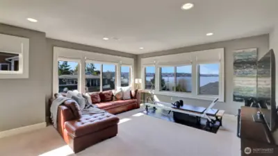 o Bonus / Media room with Kitchenette  o The kitchenette has an ample countertop, stainless sink, beverage refrigerator, and it is ready for the built-in microwave.