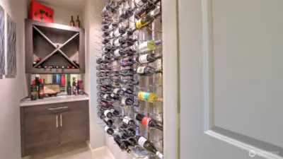 o 170+ Bottle capacity  o Floating cabinets/counter  o Naturally climate-controlled basement location  o Inconspicuous and tastefully designed to match the home interior