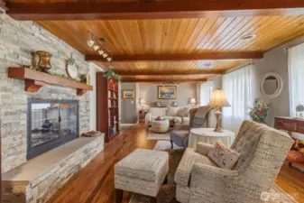 Living Room with Fireplace. Bamboo Floors. Tongue and Groove and Open Beam Ceiling.