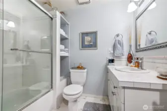 Bright and fresh hall bathroom with a clean, stylish design.