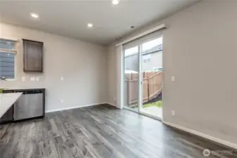 Breakfast nook with slider to back patio