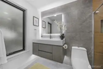 Don't miss the heated floors and smart mirror