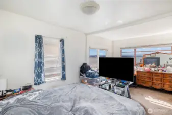 Upstairs bedroom with plenty of natural light.