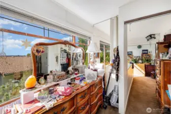 Windows flood the space with natural light and showcase stunning outdoor views.