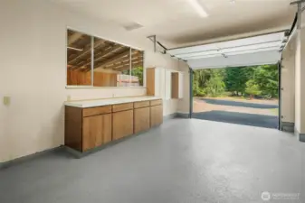 Extremely clean attached one-car garage has room for your workbench, tools, and groceries.