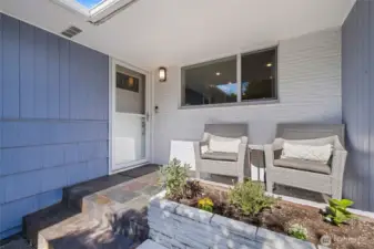 Charming entry with a cozy sitting area—perfect for morning coffee