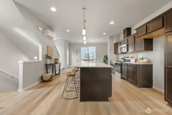 Photographs are for illustrative purposes only. Features, finishes, interior/exterior colors, landscaping and floorplan shown may vary from actual homes built.