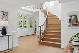 Grand Curved Staircase (New engineered hardwood flooring thoughout)
