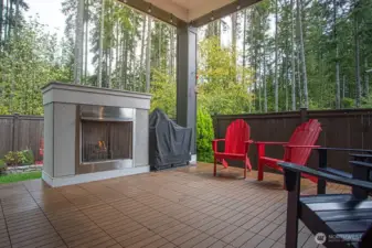 private deck with outdoor gas fireplace