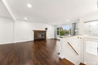Stairs leading to basement from main living room.