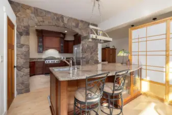 Cooks kitchen features two sinks, 2 dishwashers, double oven, and 6 burner gas stove...