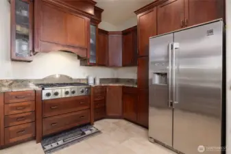 Plenty of cabinets & oversized refrigerator/freezer...
