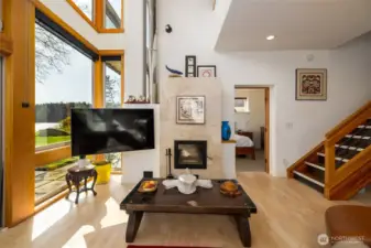 Extremely efficient European designed fireplace can be seen from main floor primary suite as well...