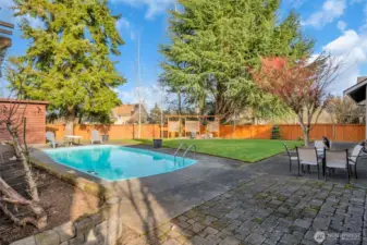 Spacious backyard retreat with pool, firepit, and room to relax or entertain
