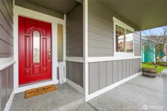 A cheerful covered entry offers comfort in all seasons.