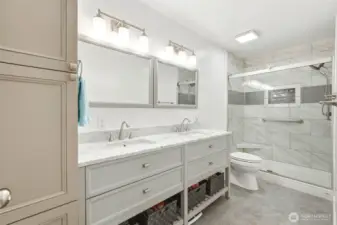 Beautifully updated with a double vanity and walk-in shower- bright, polished, and thoughtfully designed.