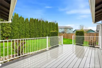 Just off the main living space, the deck extends your living outdoors—ideal for morning coffee or an easy dinner outside.