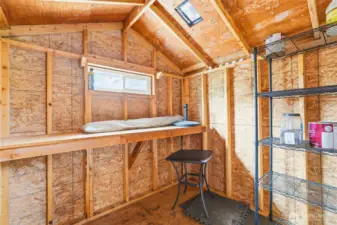 Handy shed provides for additional outdoor storage.