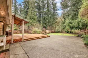 Generous outdoor space with deck access and room to gather.