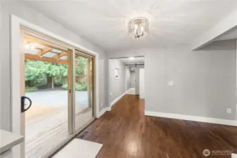 The dining area leads to the garage and laundry room.