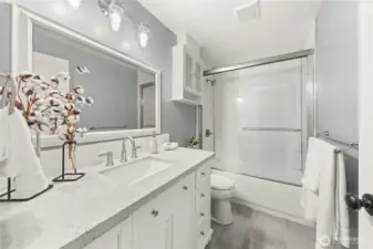 Gorgeous first bathroom featuring granite countertops and quality craftsmanship tile work.