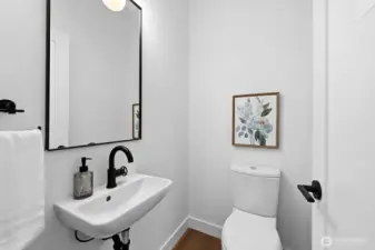 Coveted main floor powder room.