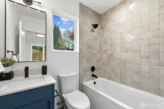 Full en suite bathroom on the lower level.