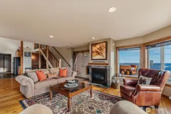 Living room with view of propane fire place