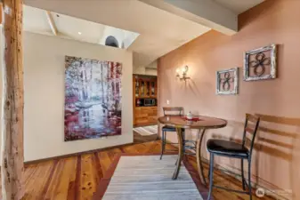 Bistro set and transition between pantry and bedrooms