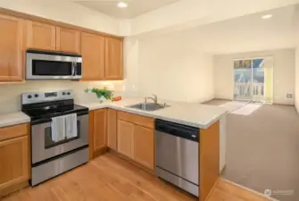 Entertain guests while in the kitchen.  Perfect open concept.