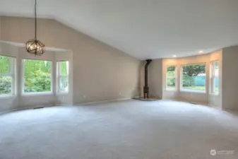 vaulted ceiling with wood stove