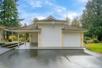 Look at this amazing 3 bay detached shop! RV bay and carport in front of 1st bay