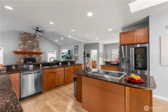 This kitchen is a chef's dream. Plenty of space to cook or bake without being cut off from your family or guests!