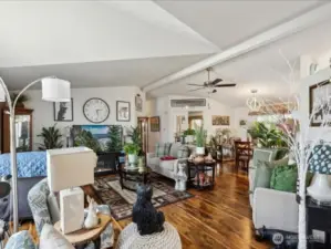 Large family room with vaulted ceiling.