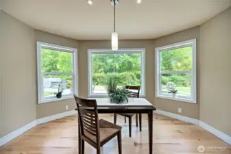 Beyond the kitchen windows is the huge exposed aggregate patio with the hot tub close by.