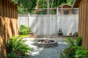 Firepit between east and west studio cabins