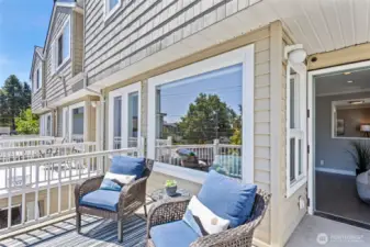 Another view of the front deck off the living room of this corner unit.