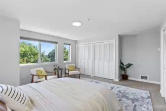 The primary has 2 walls of closets and enough room for a king bed and extra furniture.