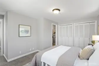 This 2nd bedroom is down the hall from the primary and has its own full bathroom.