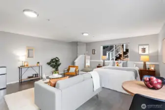 This entry level area is large and can be used in a variety of ways. With its own backyard entrance, it is ideal as an extension to the main house, as an entertainment room or a guest suite or a separated studio for additional income.