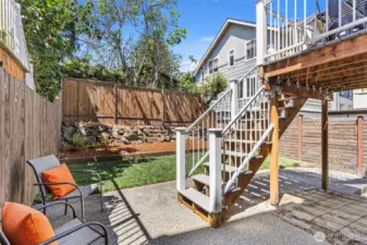 The entrance to the studio area opens to the back garden, fully fenced and gated.