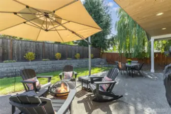 Covered and uncovered patio area with room to relax and entertain. Area on east side of home makes a great dog run.