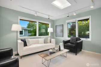 Primary suite is large and has an area for seating or home office