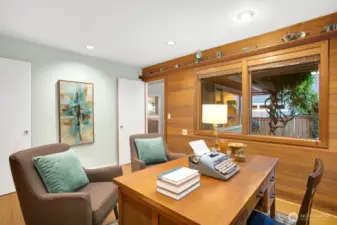 Office has warm wood walls