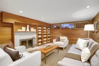Lower family room has wood burning fire place