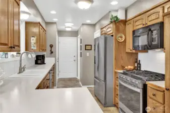The appliances are all fairly new, with the fridge and stove just around two years old, and the fridge even comes with an extended warranty for added peace of mind.