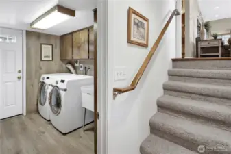 Laundry room with exterior access.