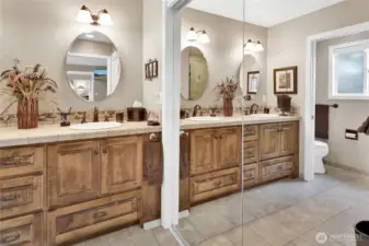 The second 8-foot closet is conveniently located just inside the primary bathroom, adding extra storage right where you need it.